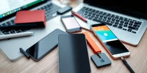 Tools for eBay to Amazon arbitrage on a desk.